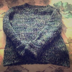 A seater/shirt. (Knitted). Great for cold times!